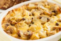 Мясо с грибами и сыром в духовке – прекрасное дополнение к гарниру